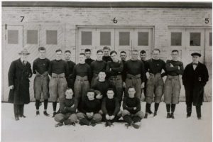 This famous photo originally ran in the Green Bay Press Gazette with the following caption: This is the Packer squad that started Green Bay rolling on its way to football fame in 1919. The members were left to right: top rowHerb Nichols, Sam Powers, Jim Coffeen, Martin Zoll, Alvin Martin, Abe Sauber, Herman Martell, Wes Leaper, Wally Ladrow, John Des Jardin (sic), Carl Zoll, Andy Muldoon, Gus Rosenow, Al Petcka, G. W. Calhoun; centerCoach Curly Lambeau; bottom rowNate Abrams, deceased, Fritz